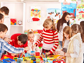 bigstock-Child-painting-at-art-school--39175162